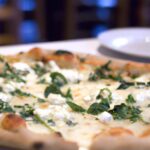 The Art of Four Cheese Pizza: Quattro Formaggi Delight